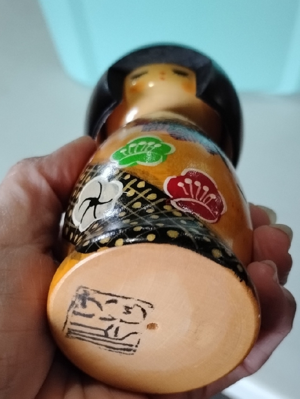 Hand-Painted Wooden Orange Kokeshi Doll with Black Hair - Classic Japanese Style - Picture 3 of 7